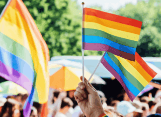 Have Pride Celebrating Pride Month with flags.