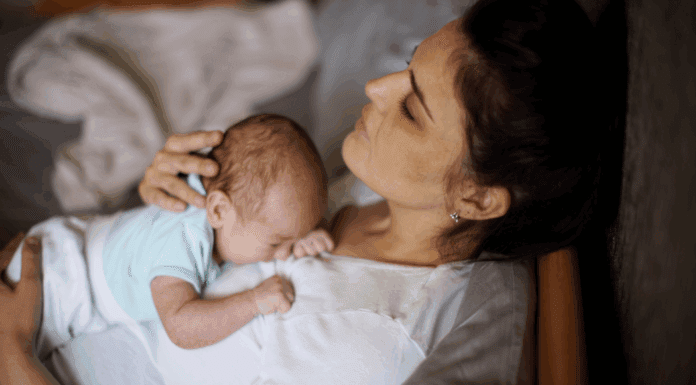 EMDR for Birth Trauma: Healing and Hope A mother holding her baby after birth.