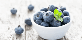 Blueberries in a white bowl.