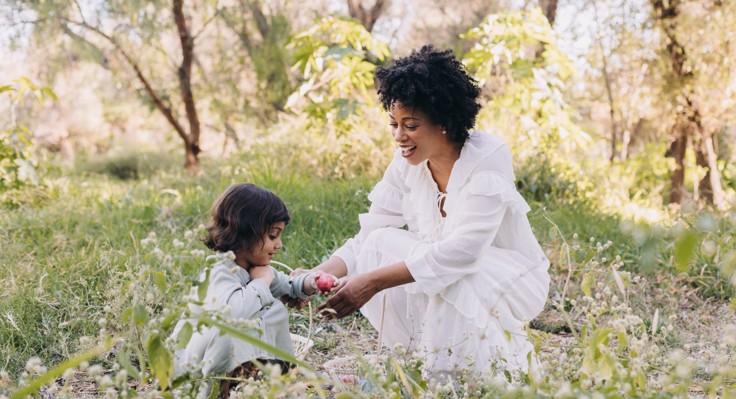 A mom exploring with her daughter.