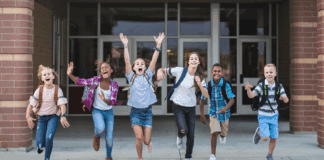 Kids running out of school.