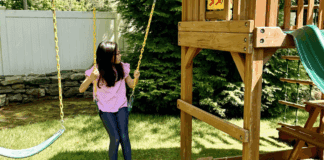 A Letter to My Firstborn A girl on a swing.
