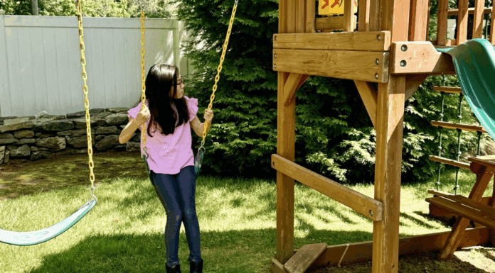 A girl on a swing.