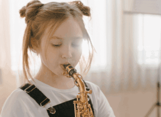 A girl playing an instrument.
