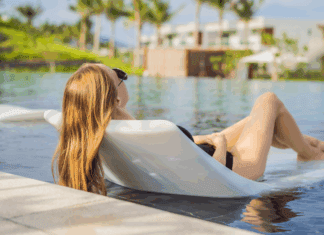Finally, a Real Vacation A woman lounging on a raft in a pool finally having a real vacation.