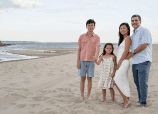 This Is 50! Contributor Anne and her family posing on the beach.