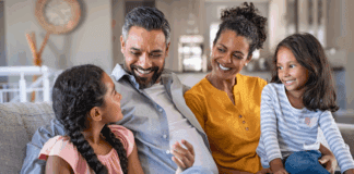 A loving family sitting together.