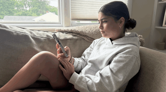I Don’t Limit My Kids’ Screen Time A teen girl on her cell phone.