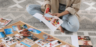 Inspiration In January with Vision Boards A woman cutting photos for a vision board.