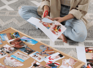 Inspiration In January with Vision Boards A woman cutting photos for a vision board.