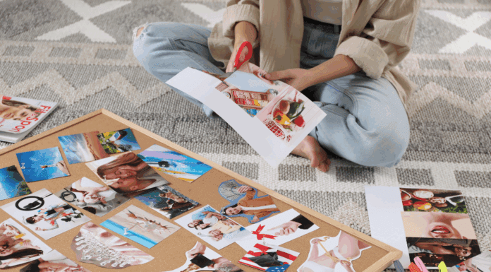Inspiration In January with Vision Boards A woman cutting photos for a vision board.