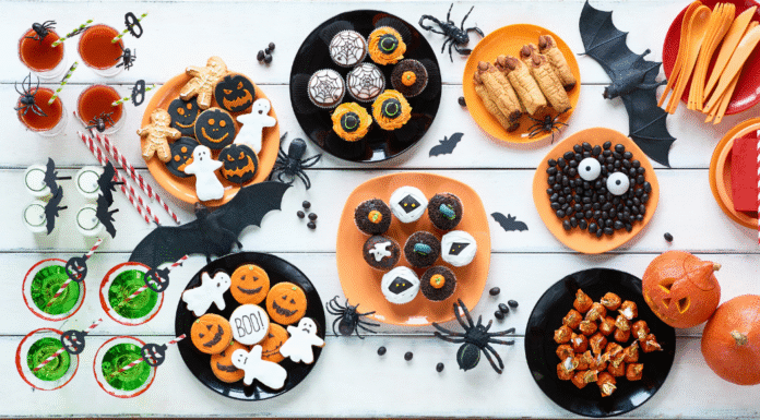 From Candy Cravings to Crushed Goals: Balancing Halloween Treats and Fitness A table of Halloween treats.