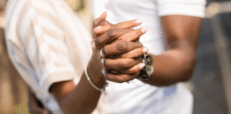 Our 14th, Oops, I Mean 16th, Wedding Anniversary A couple embracing and holding hands.
