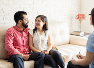 Couples In Crisis Couples in a session with a therapist.