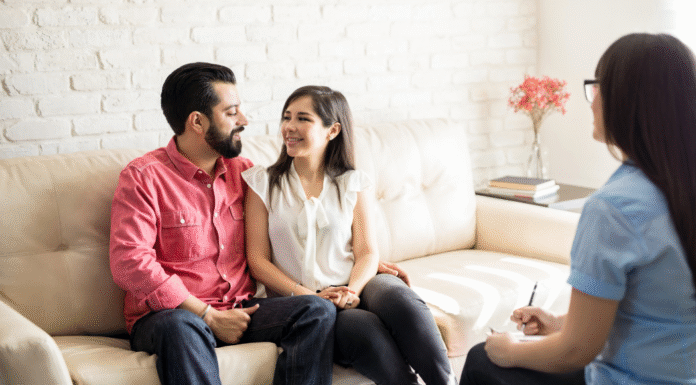 Couples In Crisis Couples in a session with a therapist.