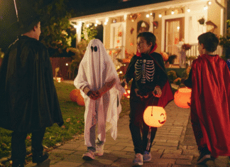 Teens trick-or-treating.