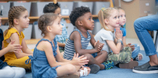Whole Body Listening Needs to Go Children practicing whole body listening at school.
