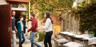 We’re the Allergy-Friendly Home A couple greeting dinner guests.