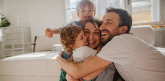 Raising Thankful Kids: How to Foster Empathy and Appreciation A family hugging.