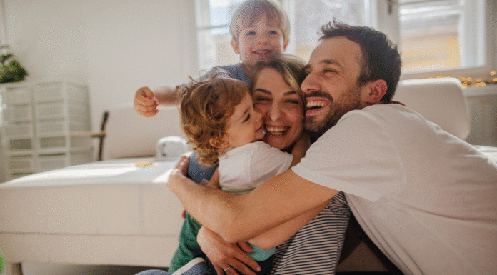 Raising Thankful Kids: How to Foster Empathy and Appreciation A family hugging.