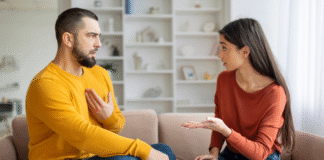 From Blame to Understanding: The Art of Listening and Emotional Connection A couple having a serious conversation.