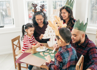 Traditions: Bridging Cultural Gaps as an Immigrant A family wearing hats and making a craft.
