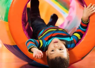 Toddler playing in an indoor play space in Westchester