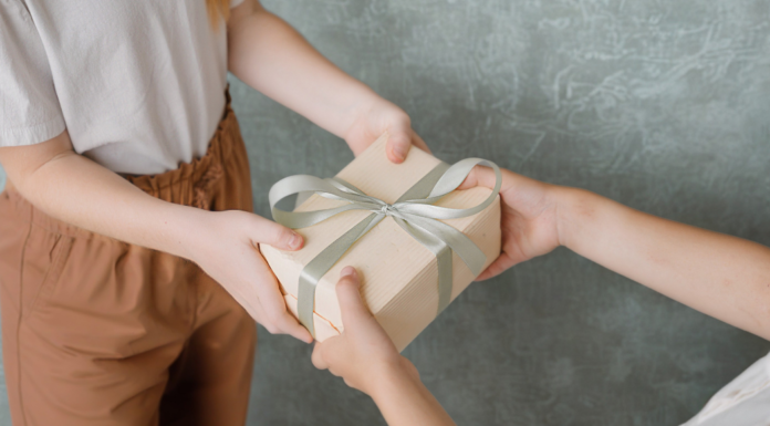 Giving a teacher a gift.