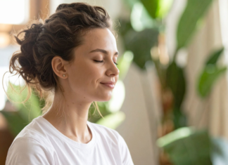 A woman being mindful and setting intentions.