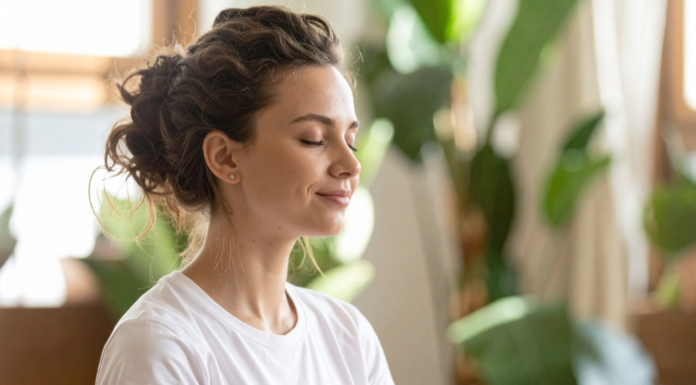 A woman being mindful and setting intentions.