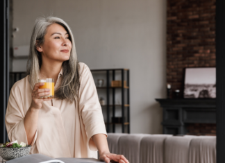 Disconnected and It Feels So Good A woman drinking a glass of orange juice.