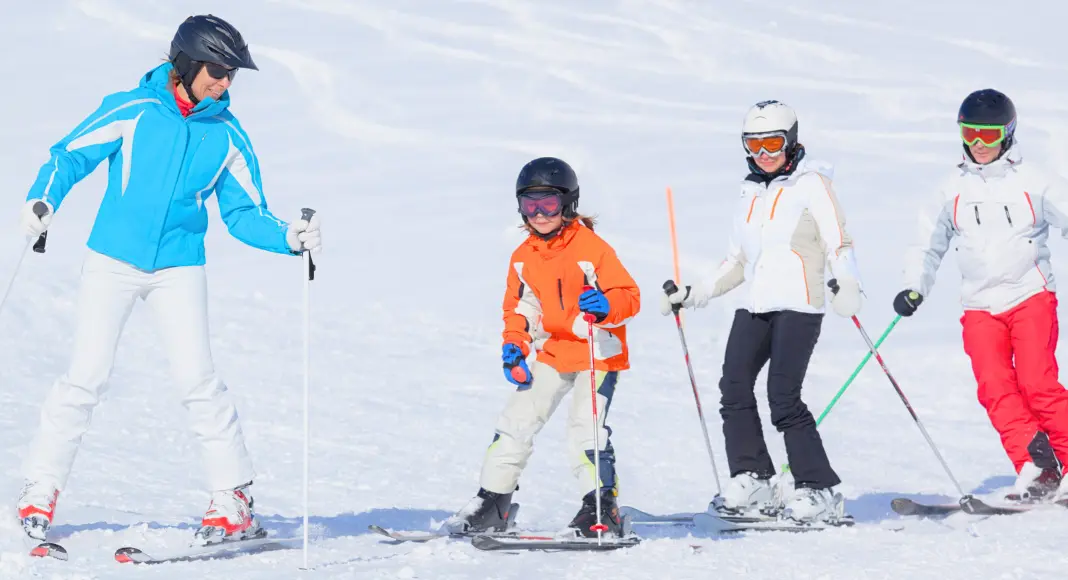 Kids learn how to ski in a group lesson near Westchester.