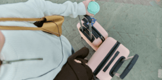 How a Chronic Over-Packer Can “Carry-On” Walking with a carry-on and travel suitcase.