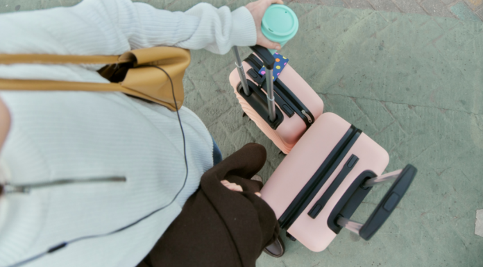 How a Chronic Over-Packer Can “Carry-On” Walking with a carry-on and travel suitcase.