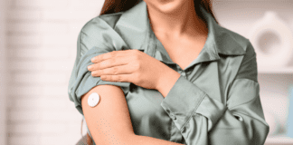 Curious About a Continuous Glucose Monitor (CGM)? A woman wearing a continuous glucose monitor.