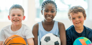 2026 Guide to Summer Camps in and Around Westchester County Kids holding sports balls for summer camp.