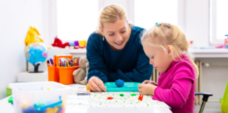 An Introduction to Special Education Services A teacher working with a student with clay.