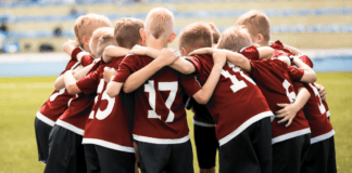 When Youth Sports Stop Being Fun A sports team in a huddle.