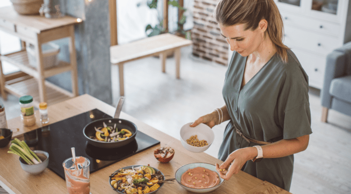A woman making a healthy meal.