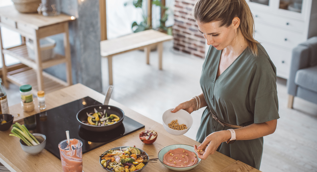 A woman making a healthy meal.
