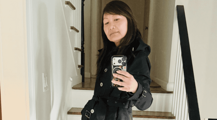 Spring Style: 3 Easy Wardrobe Refreshes A mom taking a picture with her phone of her spring fashion.