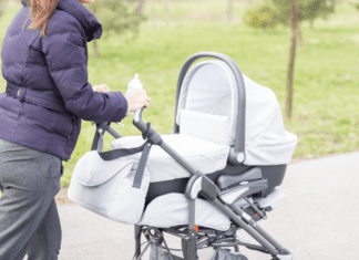 A mom pushing a stroller.