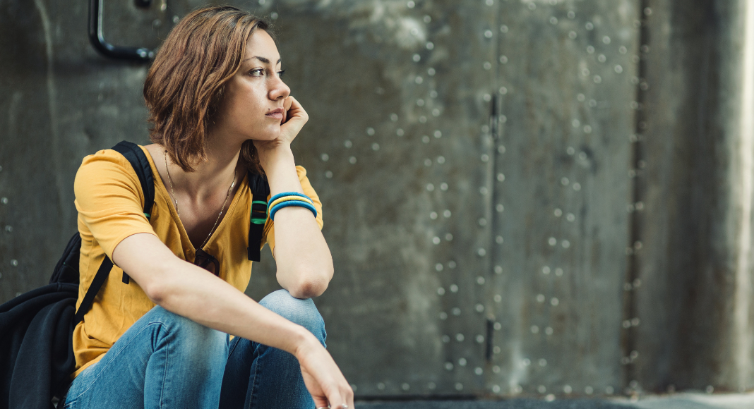 A girl sitting alone. 