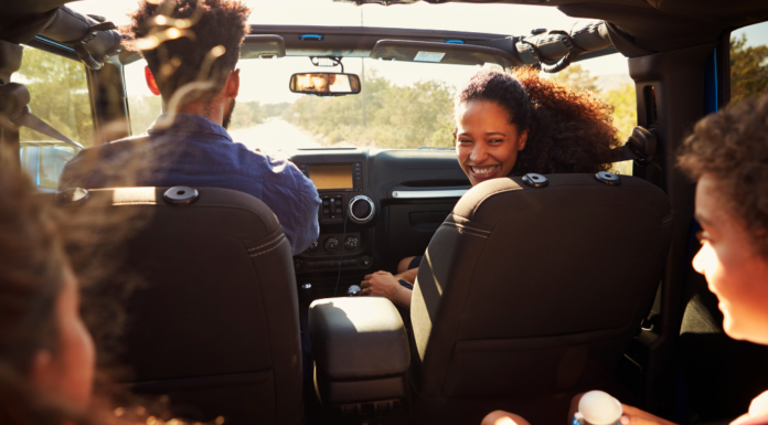 A family in the car on a road trip.