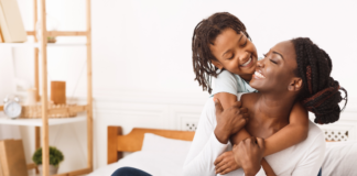 Living in Our Truth: A Letter to Mothers Everywhere A mother being hugged by her child.
