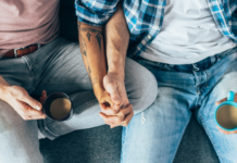 My Son Is Gay. Was I Supposed to Announce That? Gay men holding hands and drinking coffee.