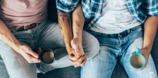 My Son Is Gay. Was I Supposed to Announce That? Gay men holding hands and drinking coffee.