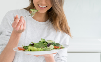 Eating salad.