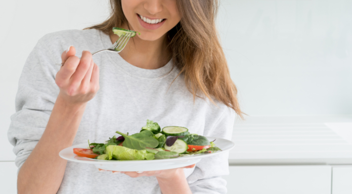 Eating salad.